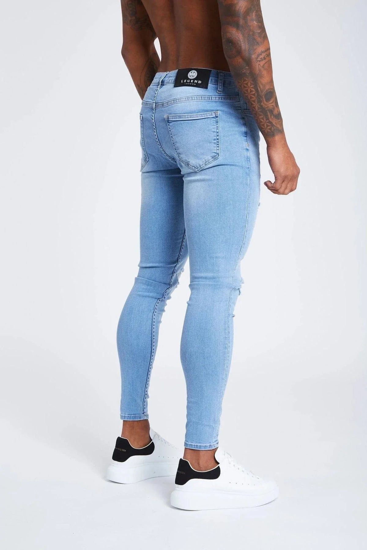 PANTALONES VAQUEROS AJUSTADOS RASGADOS AZUL CLARO