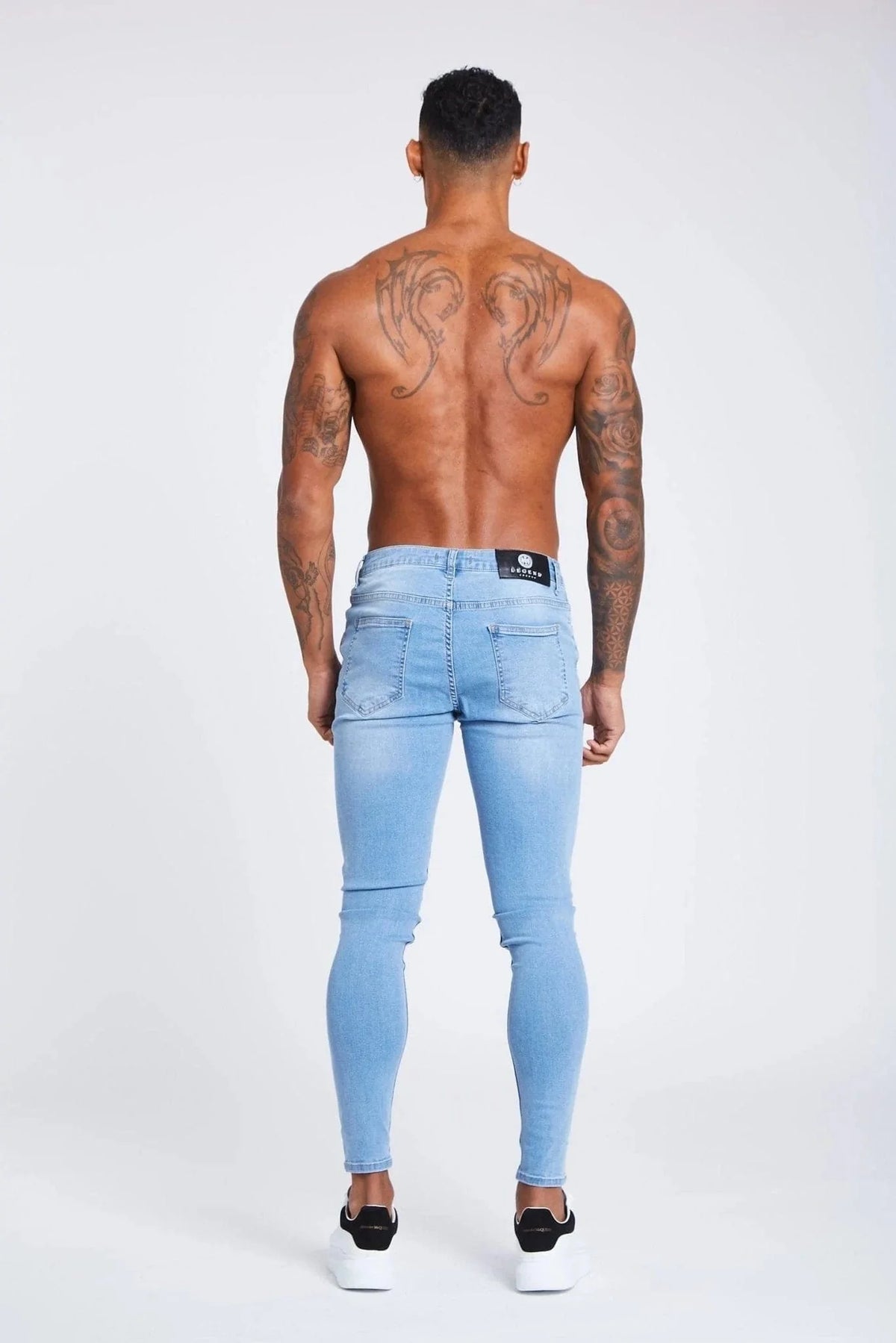 PANTALONES VAQUEROS AJUSTADOS RASGADOS AZUL CLARO