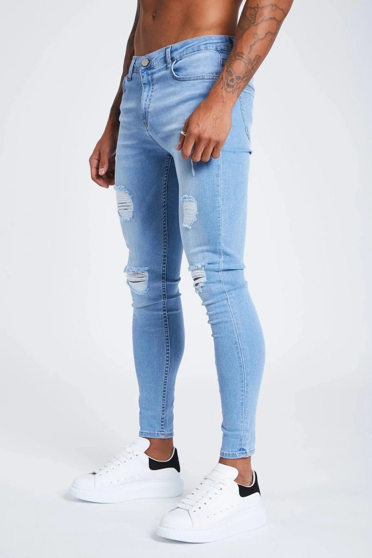PANTALONES VAQUEROS AJUSTADOS RASGADOS AZUL CLARO