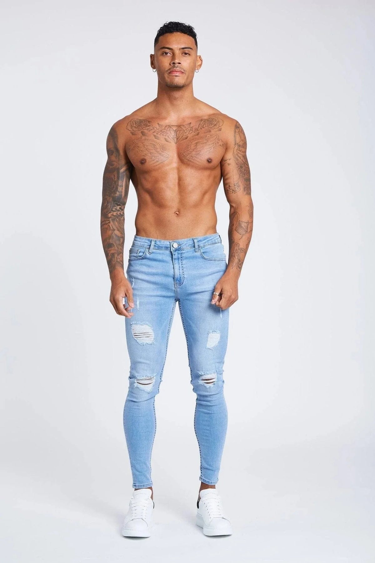 PANTALONES VAQUEROS AJUSTADOS RASGADOS AZUL CLARO