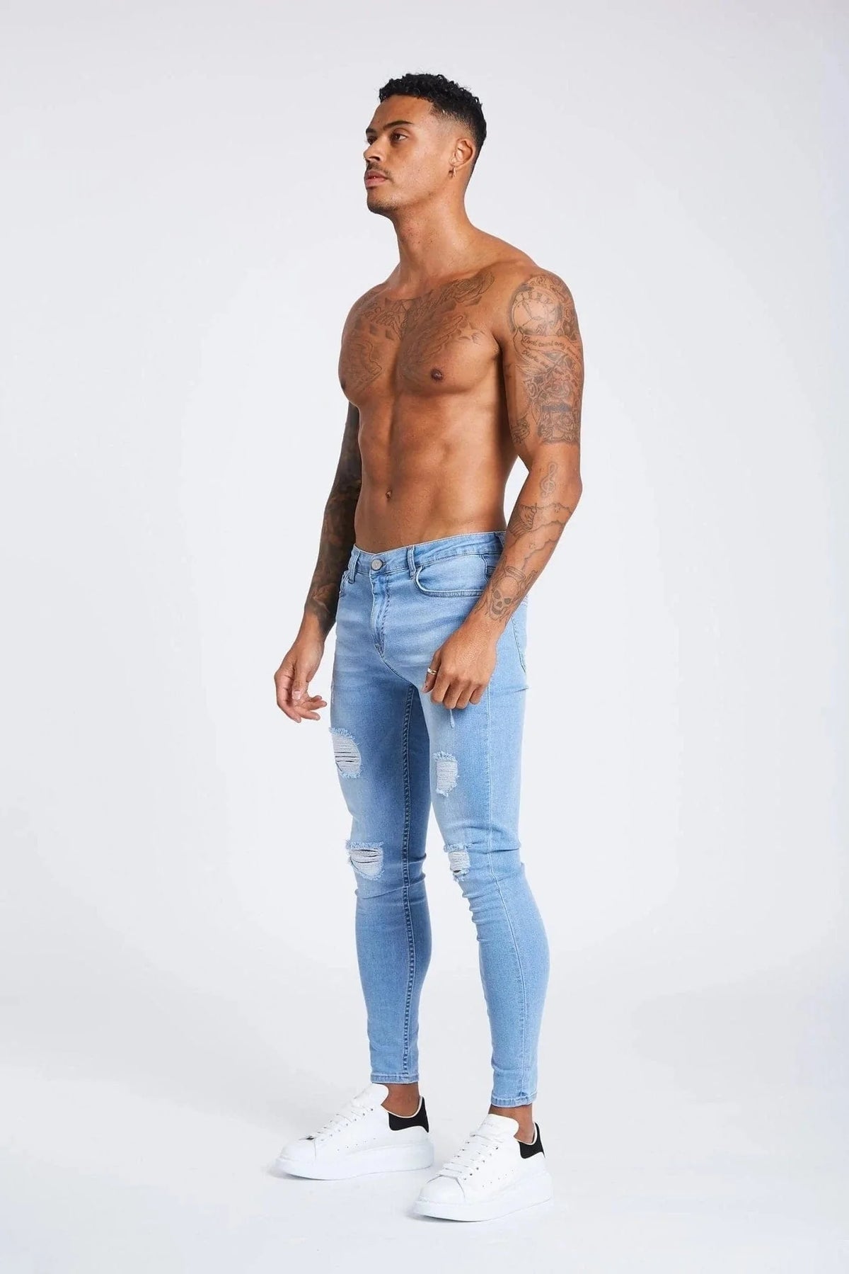 PANTALONES VAQUEROS AJUSTADOS RASGADOS AZUL CLARO