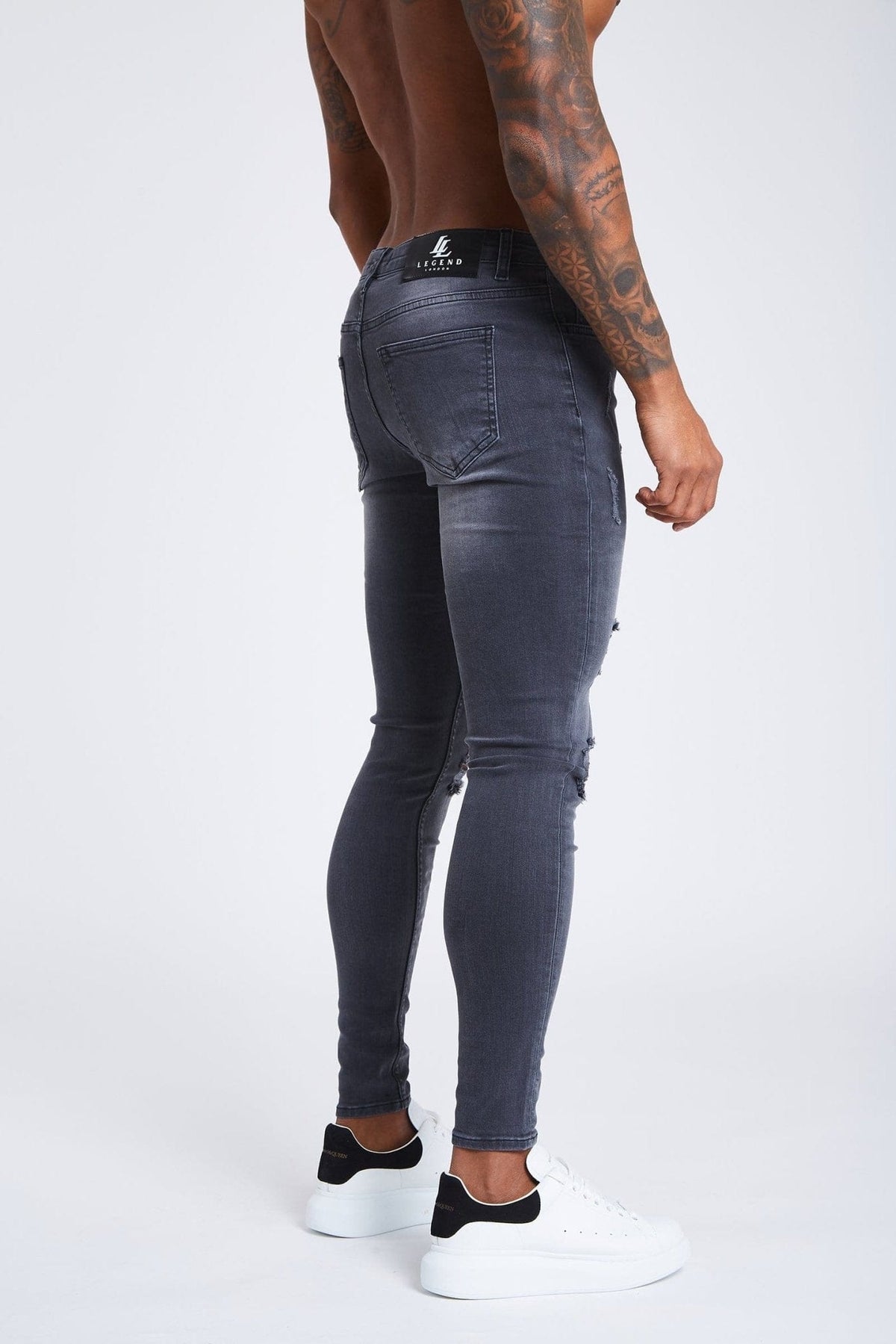 PANTALONES VAQUEROS AJUSTADOS RASGADOS GRIS OSCURO