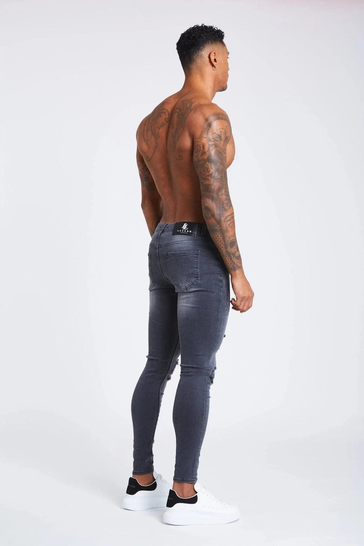 PANTALONES VAQUEROS AJUSTADOS RASGADOS GRIS OSCURO