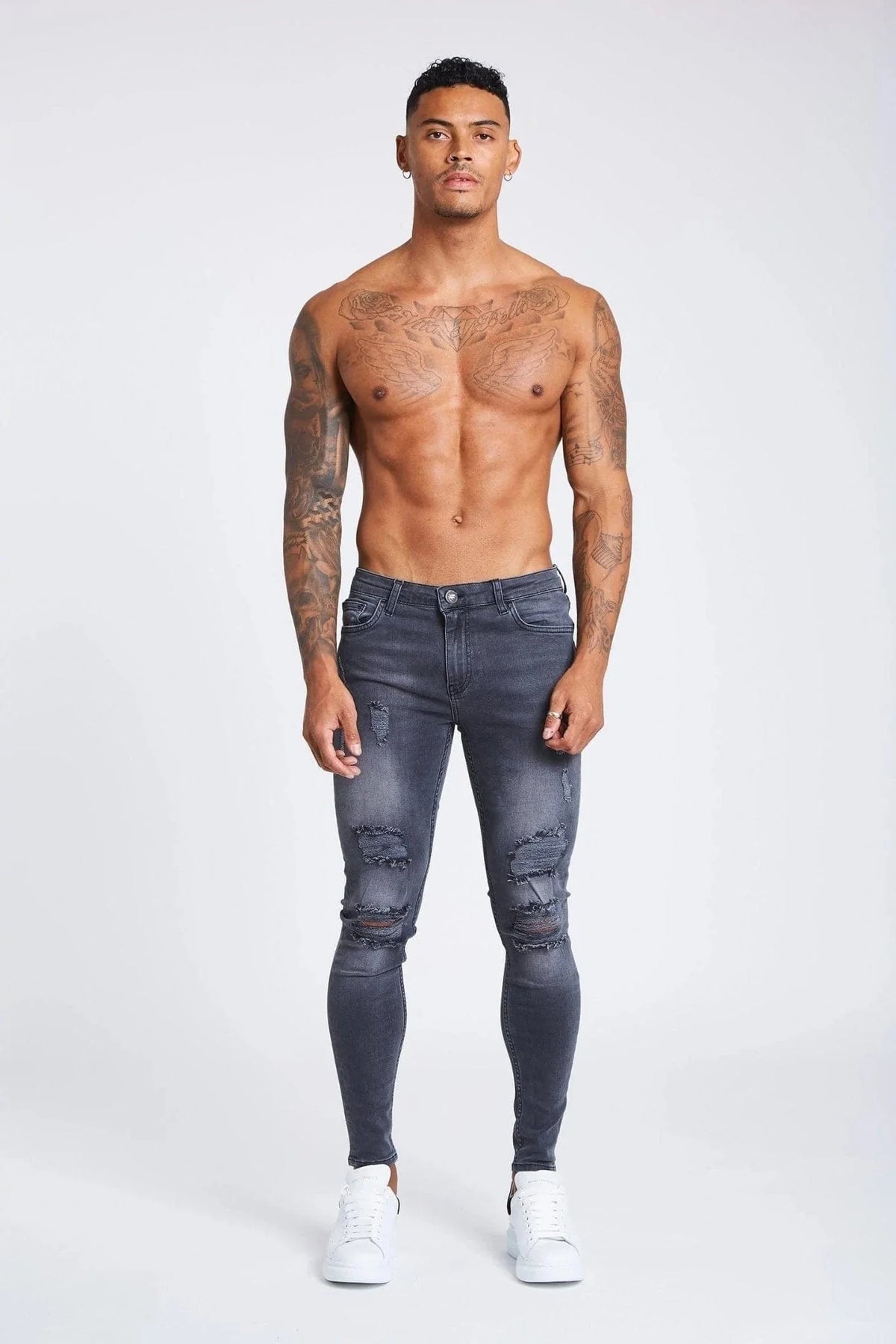PANTALONES VAQUEROS AJUSTADOS RASGADOS GRIS OSCURO