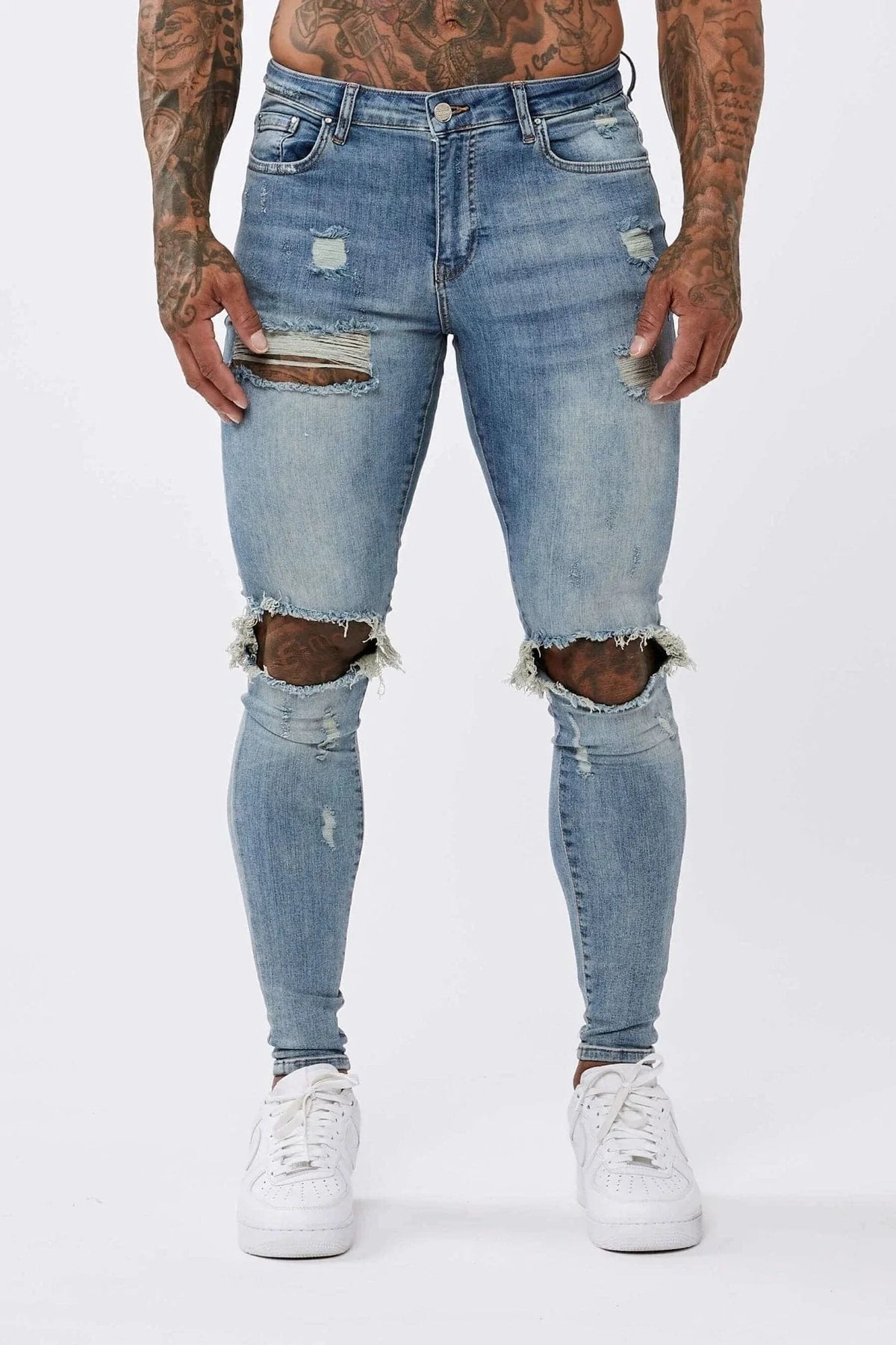PANTALONES VAQUEROS AJUSTADOS RASGADOS AZUL MEZCLILLA