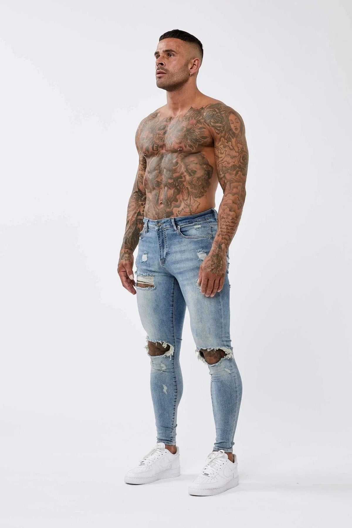 PANTALONES VAQUEROS AJUSTADOS RASGADOS AZUL MEZCLILLA
