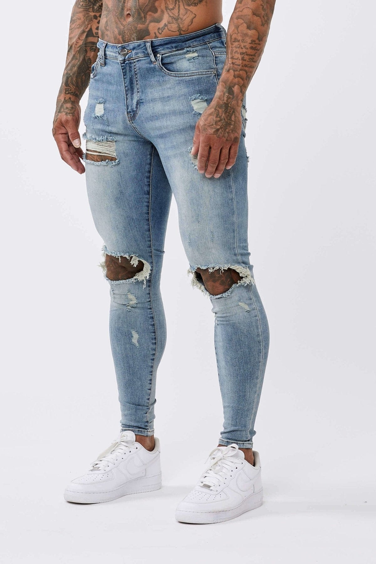 PANTALONES VAQUEROS AJUSTADOS RASGADOS AZUL MEZCLILLA
